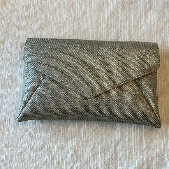 STUART WEITZMAN
The Loveletter Mini Metallic Clutch Bag - Picture 5 of 11